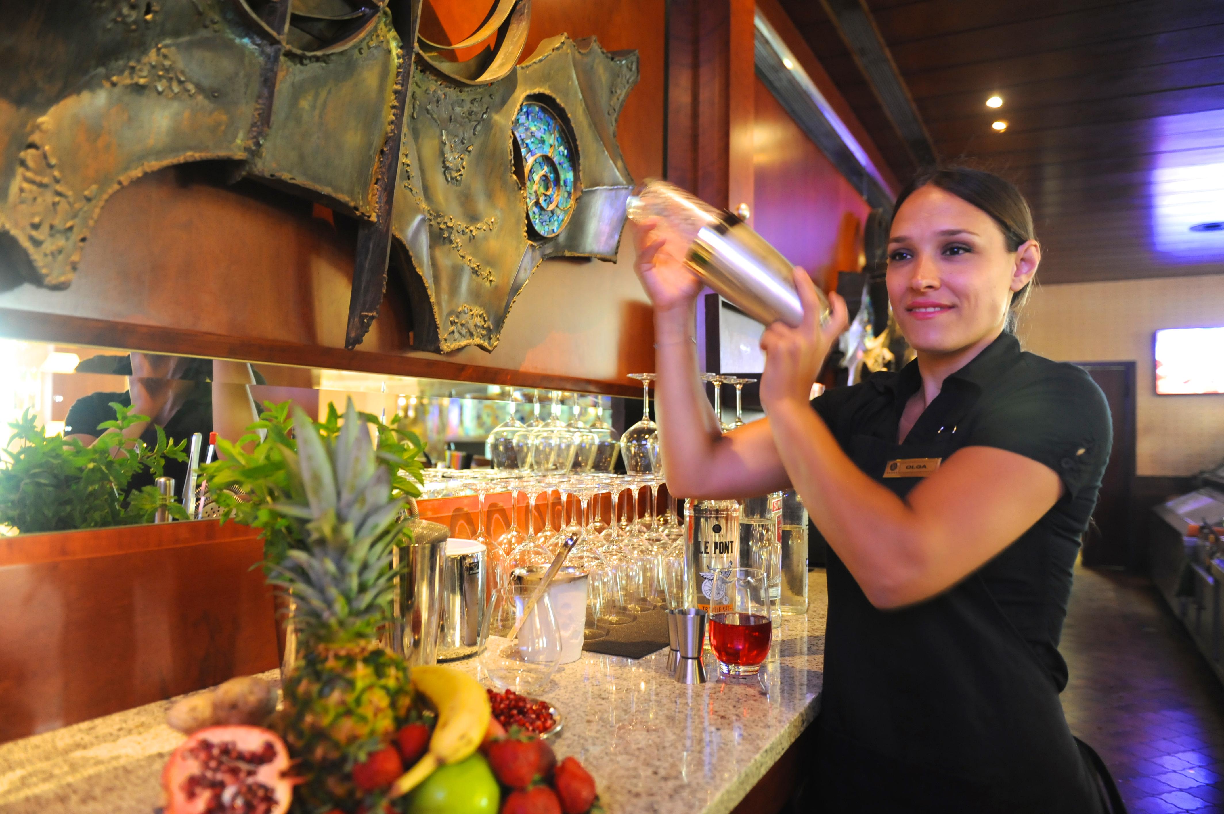 Rodos Palace Hotel Ixia  Esterno foto A bartender shaking a cocktail